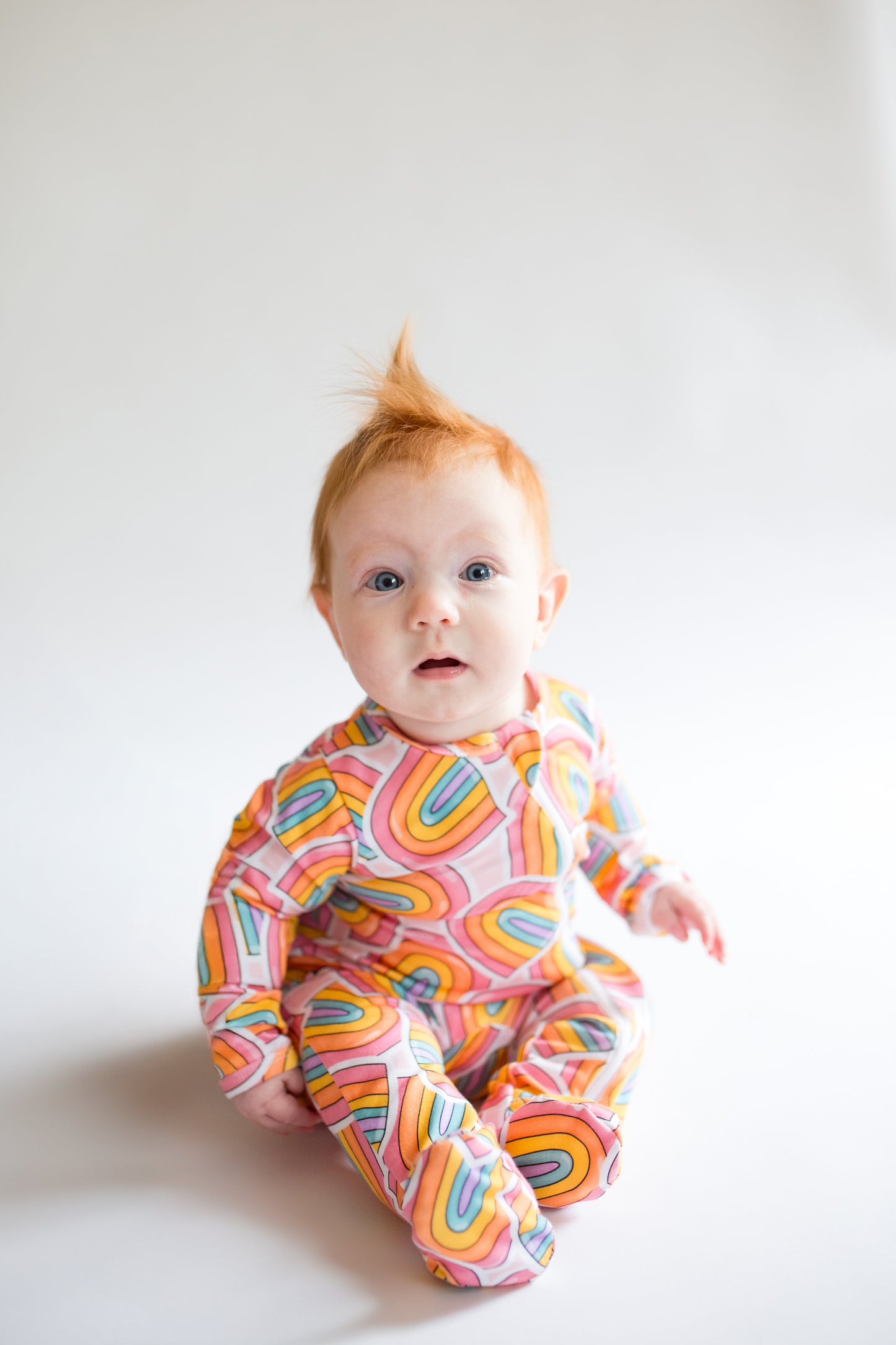 'Born to Be Bright' Rainbow Zippie Romper