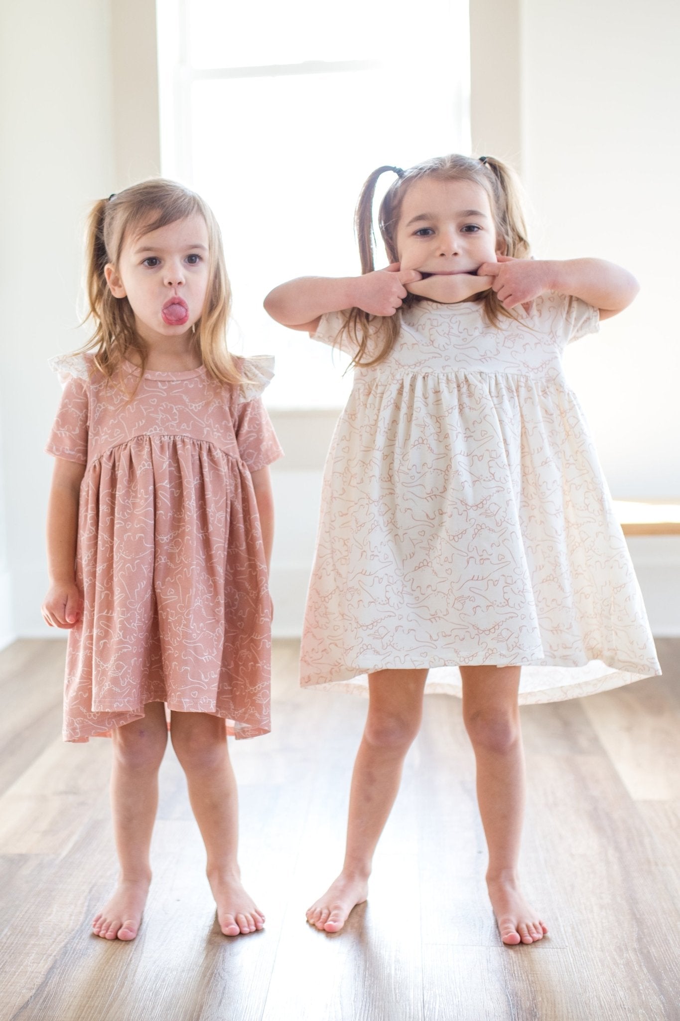 Pink Dino Flutter Dress - Astrid & Friends